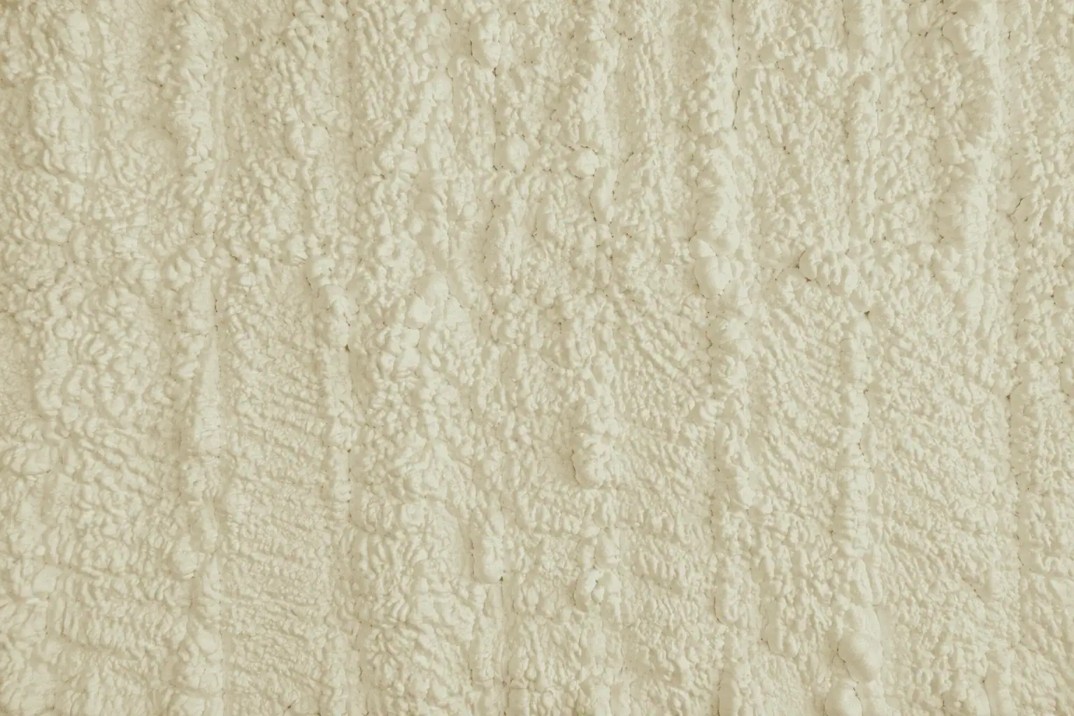 Close-up of textured insulation wall for soundproofing and thermal insulation.